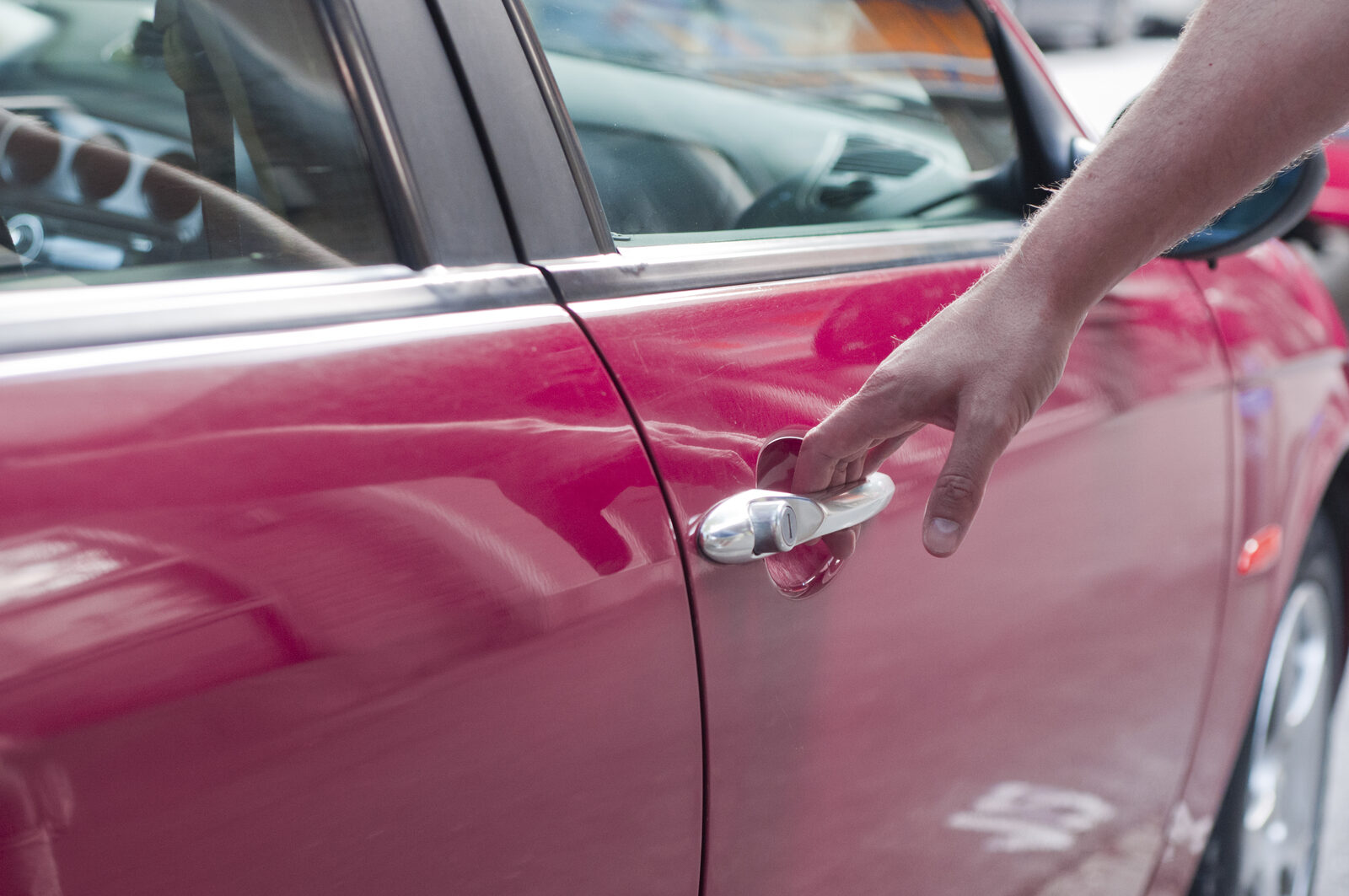 Locksmith opening a locked car in Bucharest